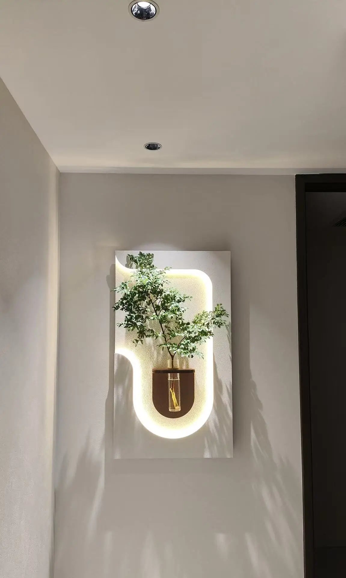 Modern Wall Lamp with Hanging Green Plants & Art